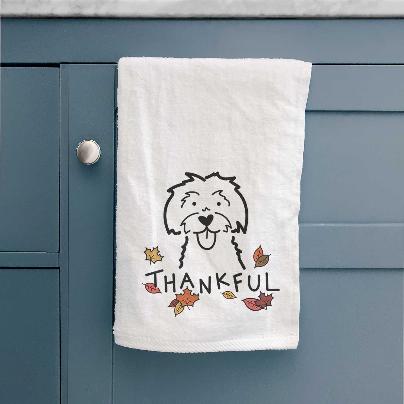Minimalist line drawing of a Maltese with 'Thankful' lettering on a decorative hand towel