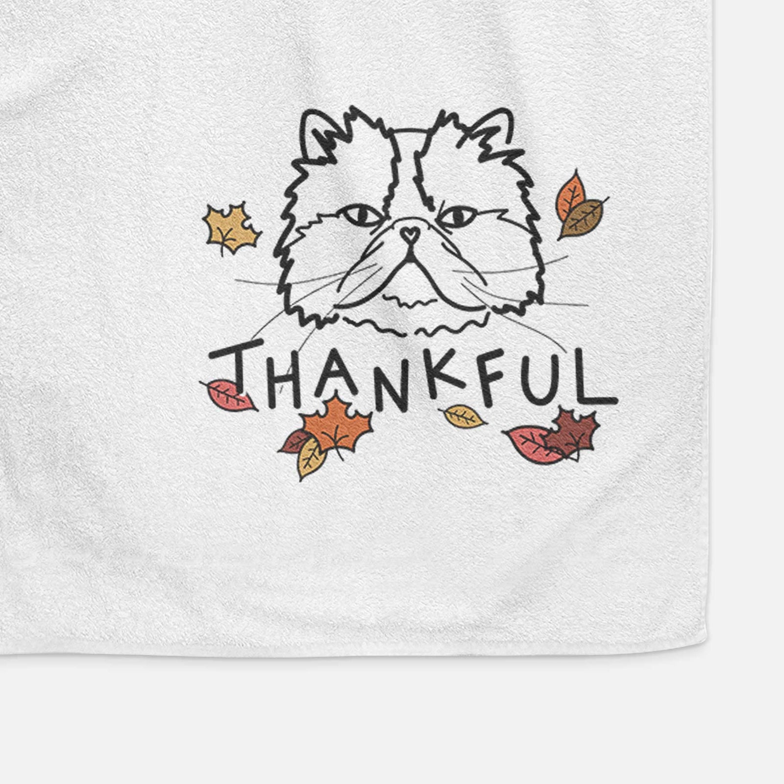 Minimalist line drawing of Mila the Persian Cat with 'Thankful' lettering on a decorative hand towel