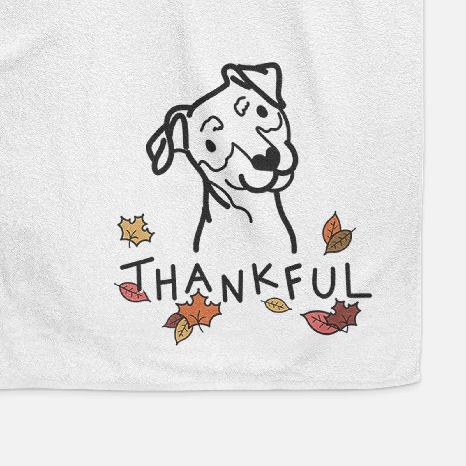 Minimalist line drawing of a Mini Pinscher with 'Thankful' lettering on a decorative hand towel