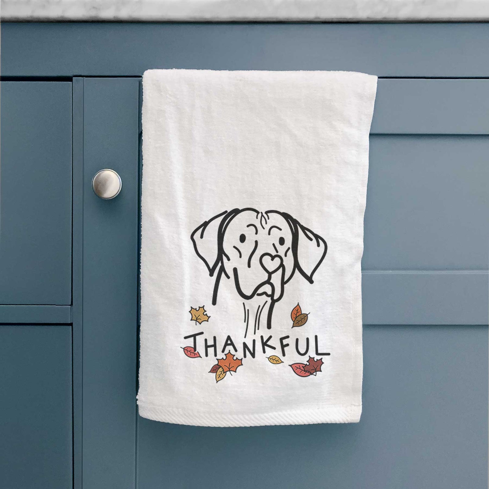 Minimalist line drawing of Moose the Vizsla with 'Thankful' lettering on a decorative hand towel