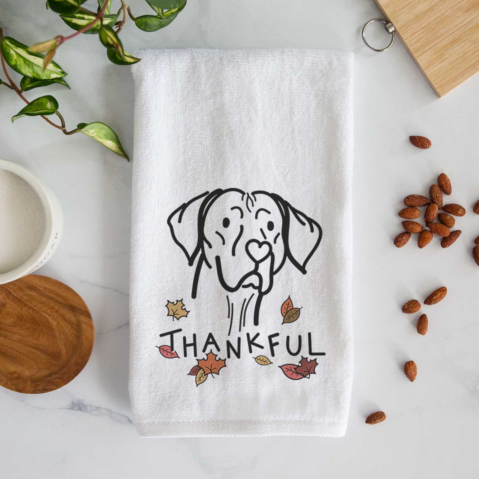 Minimalist line drawing of Moose the Vizsla with 'Thankful' lettering on a decorative hand towel