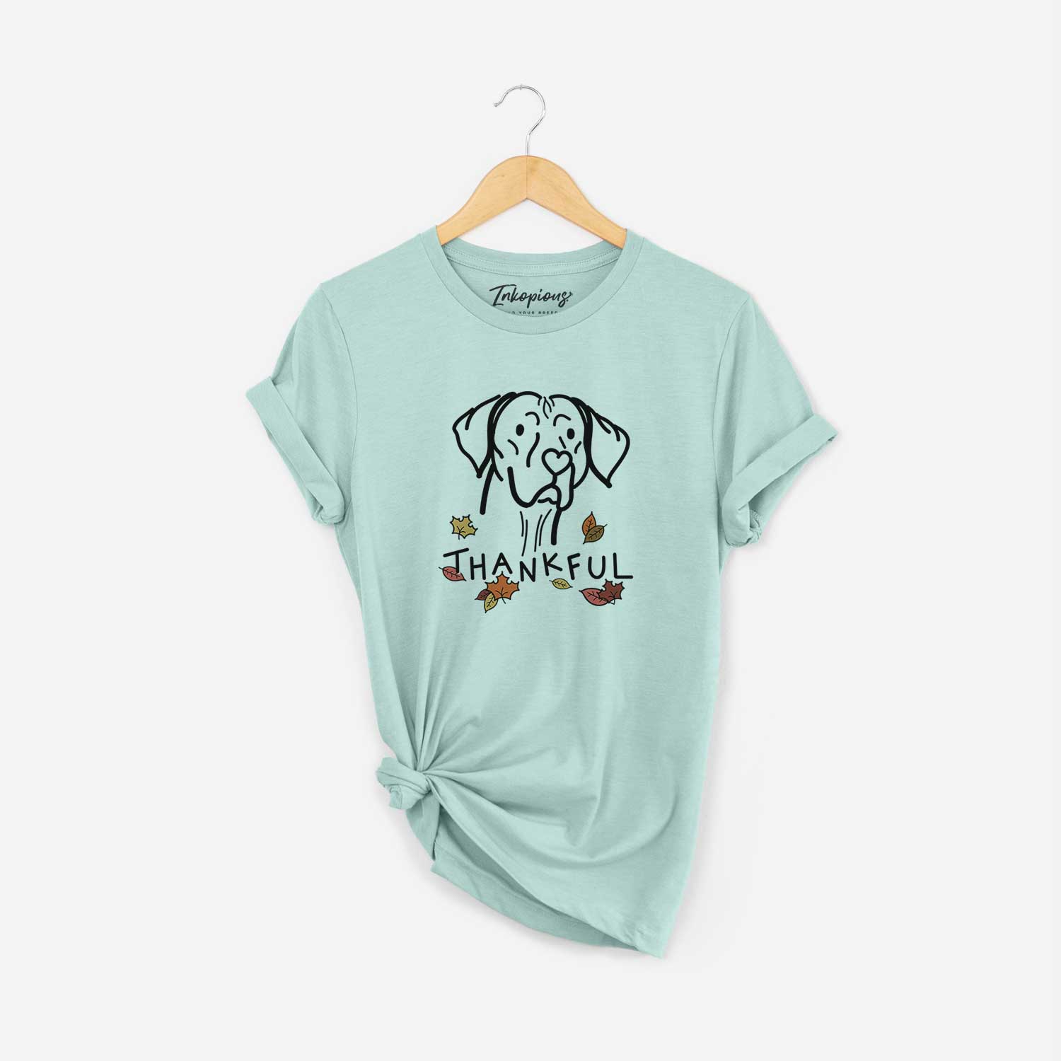 Minimalist line drawing of Moose the Vizsla with 'Thankful' lettering on a Heather Sage Unisex crewneck