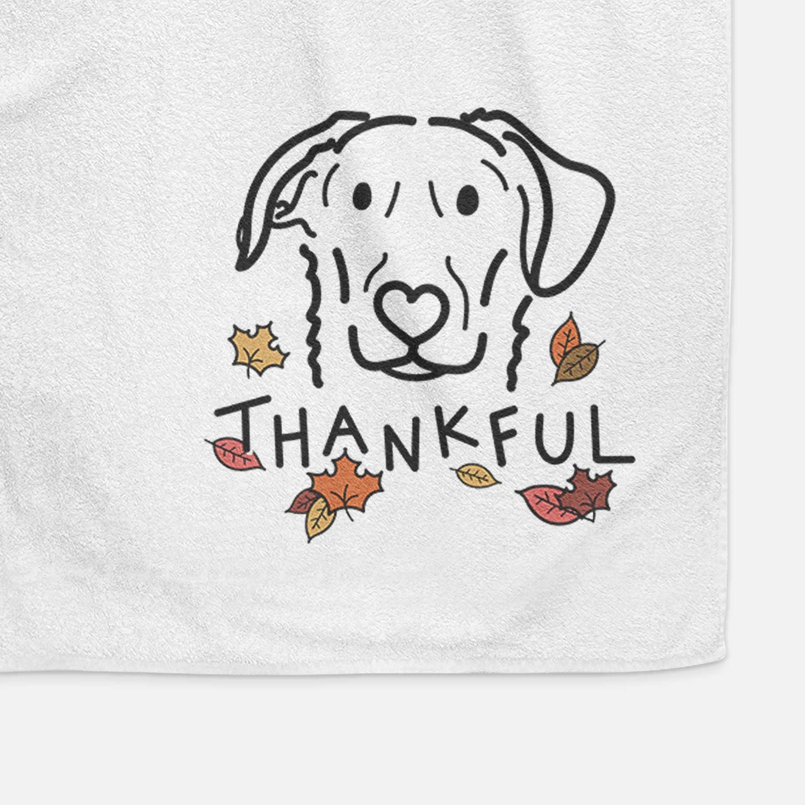Minimalist line drawing of Morrison the German Shepherd Mix with 'Thankful' lettering on a decorative hand towel