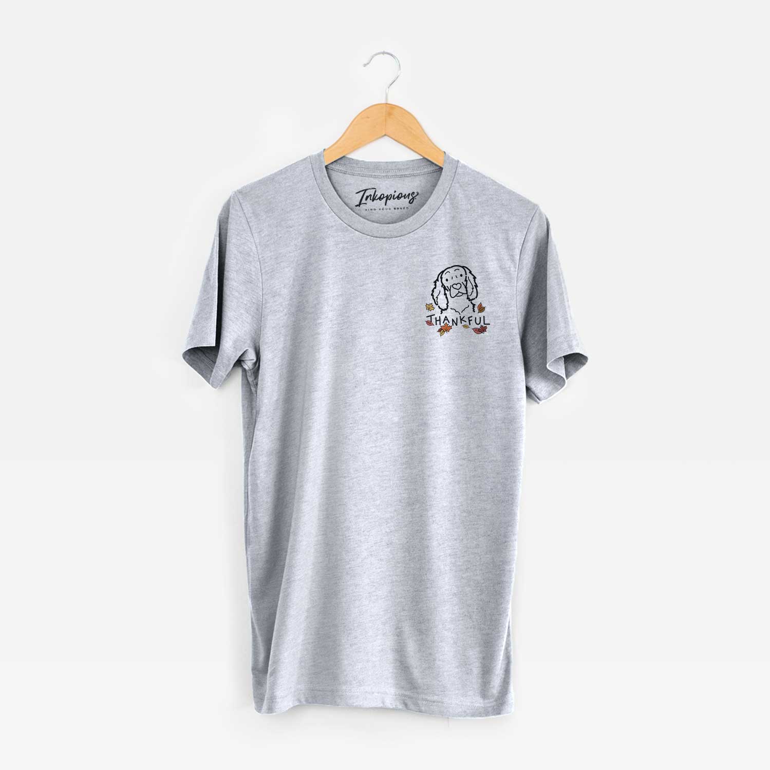 Small chest-pocket minimalist line drawing of a Boykin Spaniel with 'Thankful' lettering on a Grey Unisex crewneck