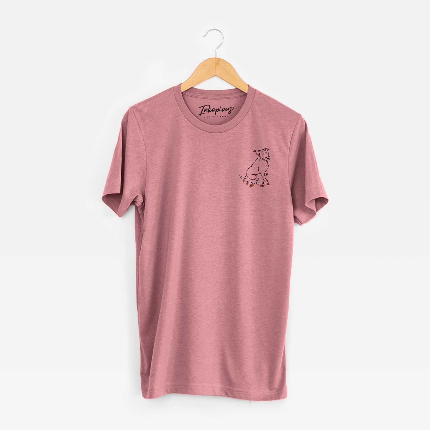 Small chest-pocket minimalist line drawing of Rocky the Rottweiler Mix with 'Thankful' lettering on a Mauve Unisex crewneck