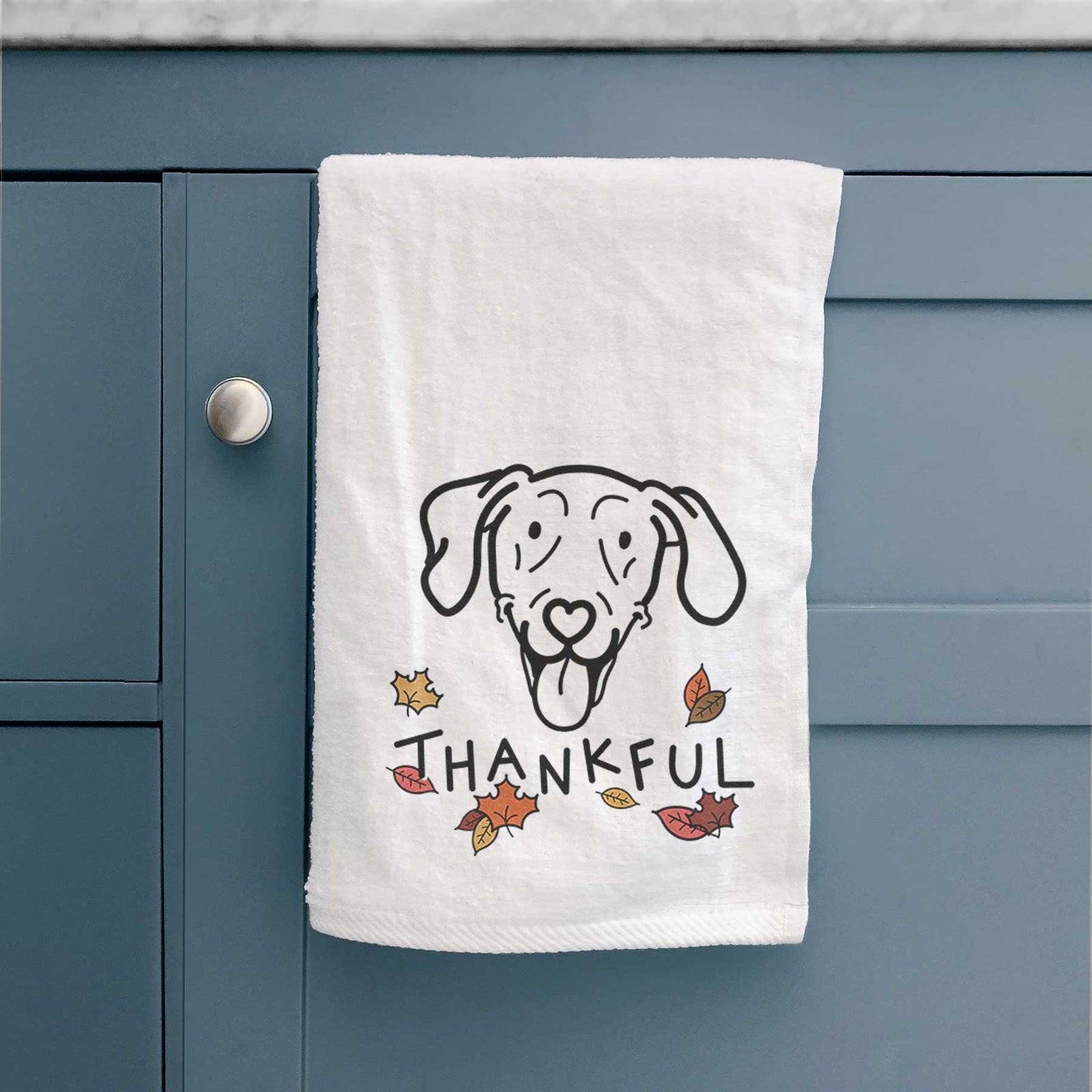 Minimalist line drawing of Paco Lobo the Weimaraner with 'Thankful' lettering on a decorative hand towel