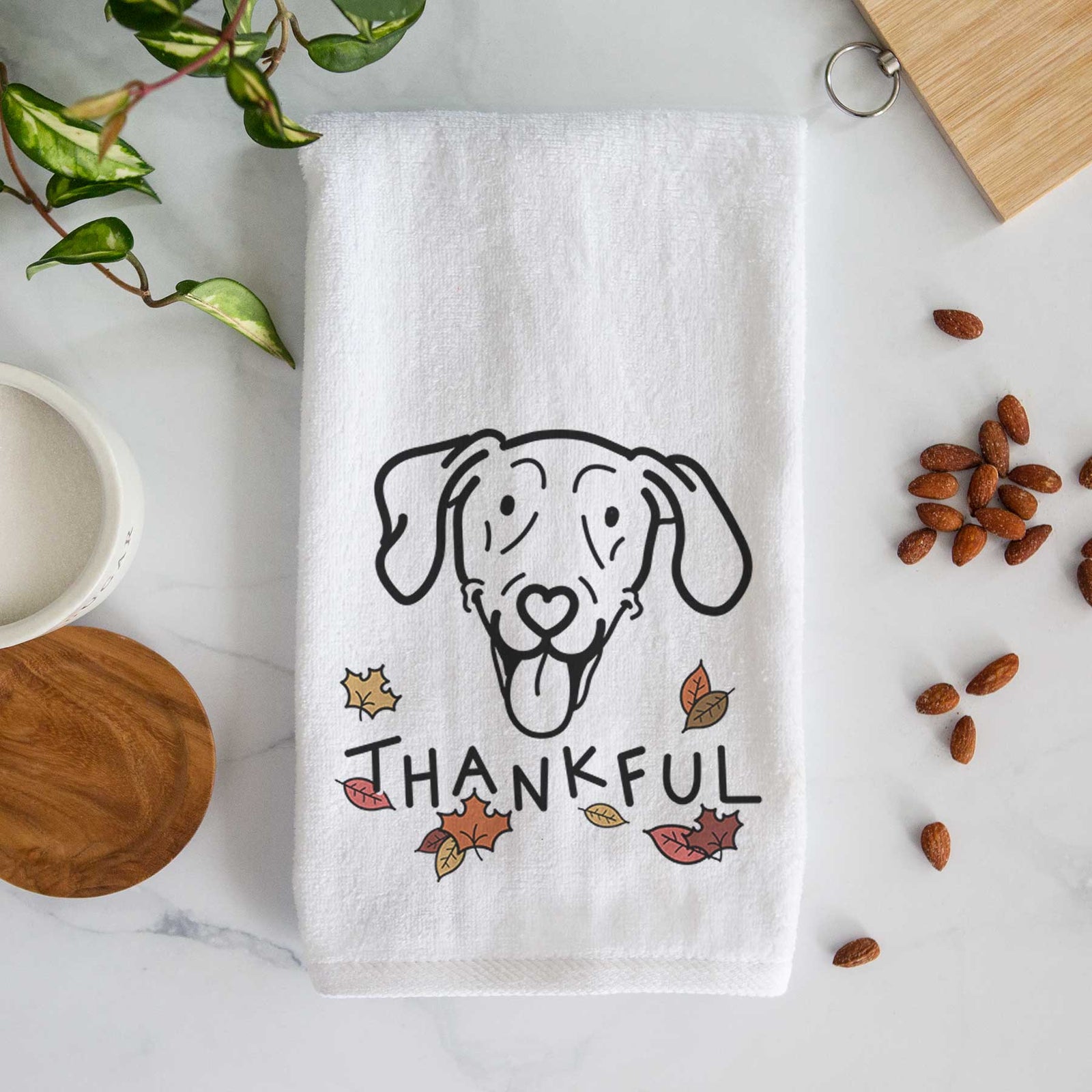 Minimalist line drawing of Paco Lobo the Weimaraner with 'Thankful' lettering on a decorative hand towel