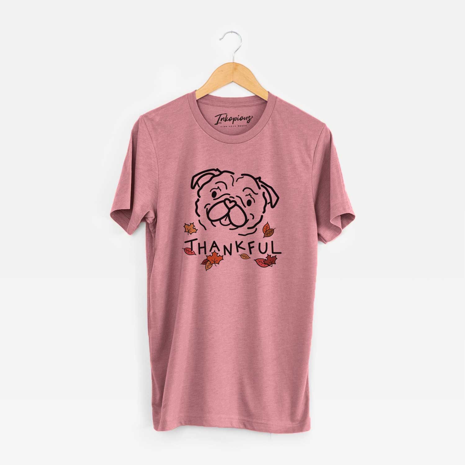 Minimalist line drawing of Pip the Pug with 'Thankful' lettering on a Mauve Unisex crewneck