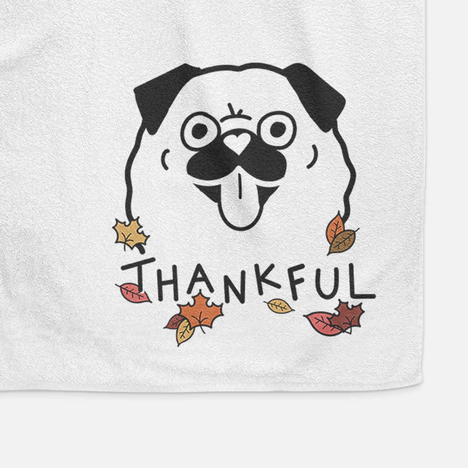 Minimalist line drawing of a Pug with 'Thankful' lettering on a decorative hand towel
