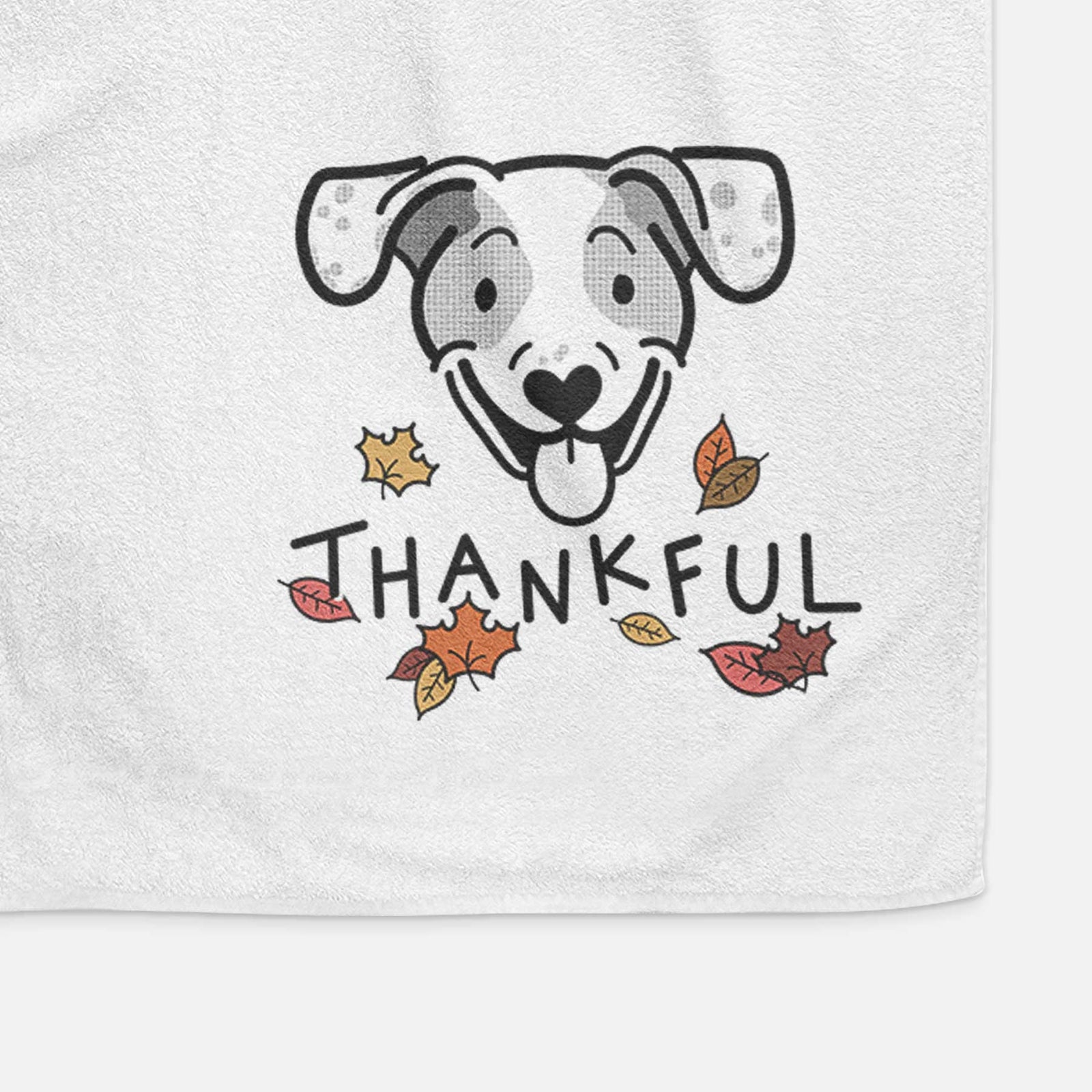 Minimalist line drawing of Roland the Beagle Mix with 'Thankful' lettering on a decorative hand towel