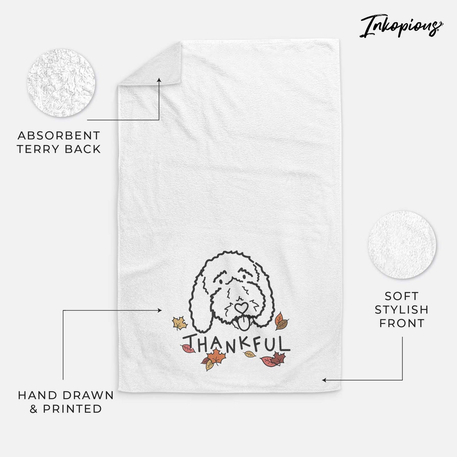 Minimalist line drawing of Ruby the Bernedoodle with 'Thankful' lettering on a decorative hand towel