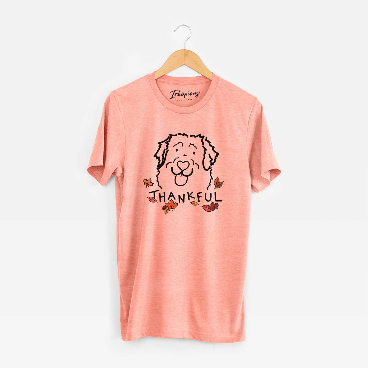 Minimalist line drawing of Sabre the Leonberger with 'Thankful' lettering on a Sunset Unisex crewneck