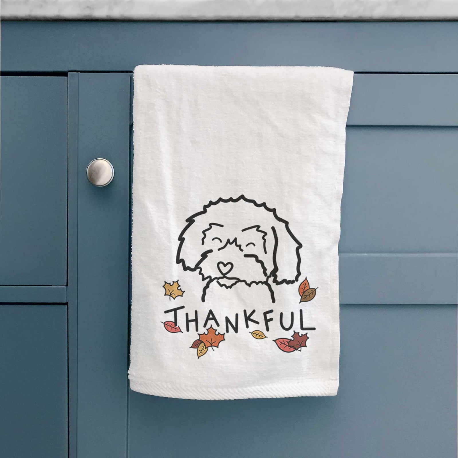 Minimalist line drawing of a Schnoodle with 'Thankful' lettering on a decorative hand towel
