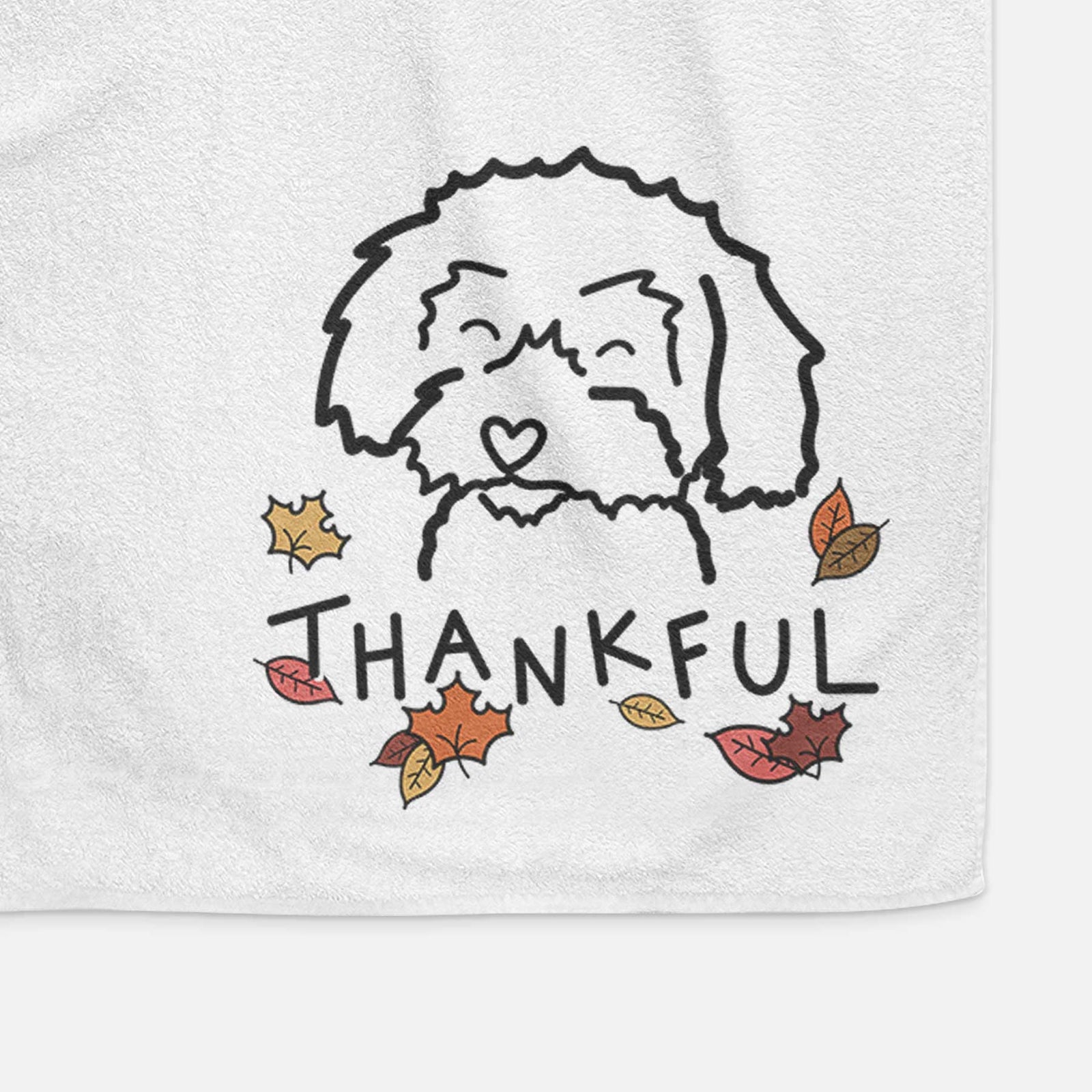 Minimalist line drawing of a Schnoodle with 'Thankful' lettering on a decorative hand towel