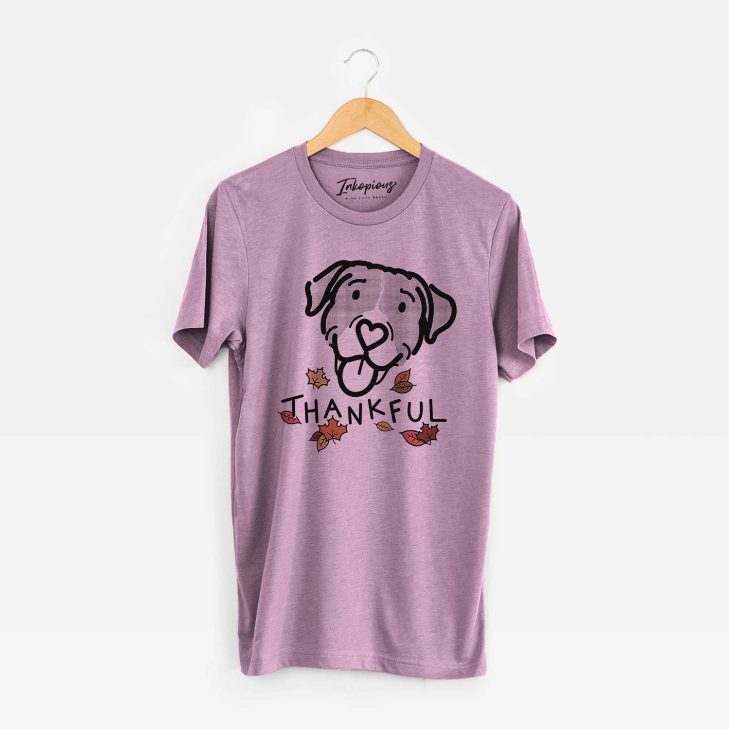 Minimalist line drawing of Shadow the Pitbull Mix with 'Thankful' lettering on an Orchid Unisex crewneck