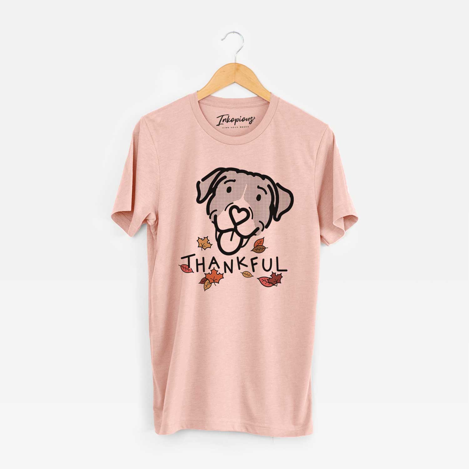 Minimalist line drawing of Shadow the Pitbull Mix with 'Thankful' lettering on a Peach Unisex crewneck