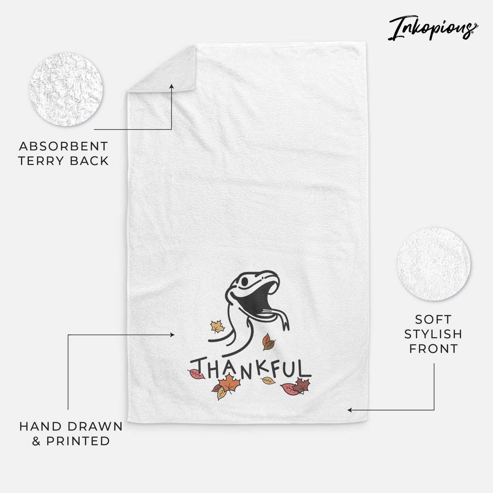 Minimalist line drawing of Spike the Snake with 'Thankful' lettering on a decorative hand towel