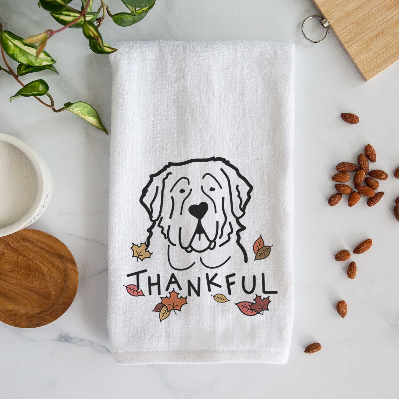 Minimalist line drawing of a Saint Bernard with 'Thankful' lettering on a decorative hand towel
