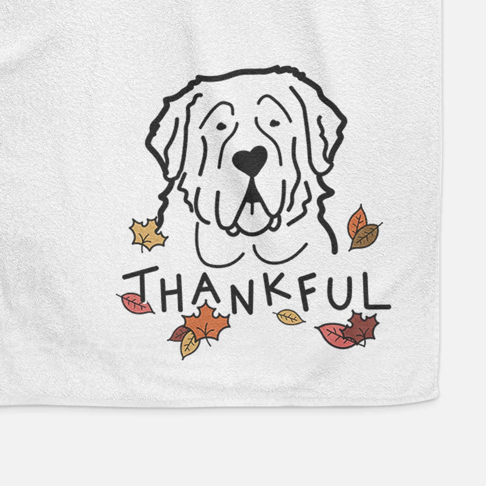 Minimalist line drawing of a Saint Bernard with 'Thankful' lettering on a decorative hand towel