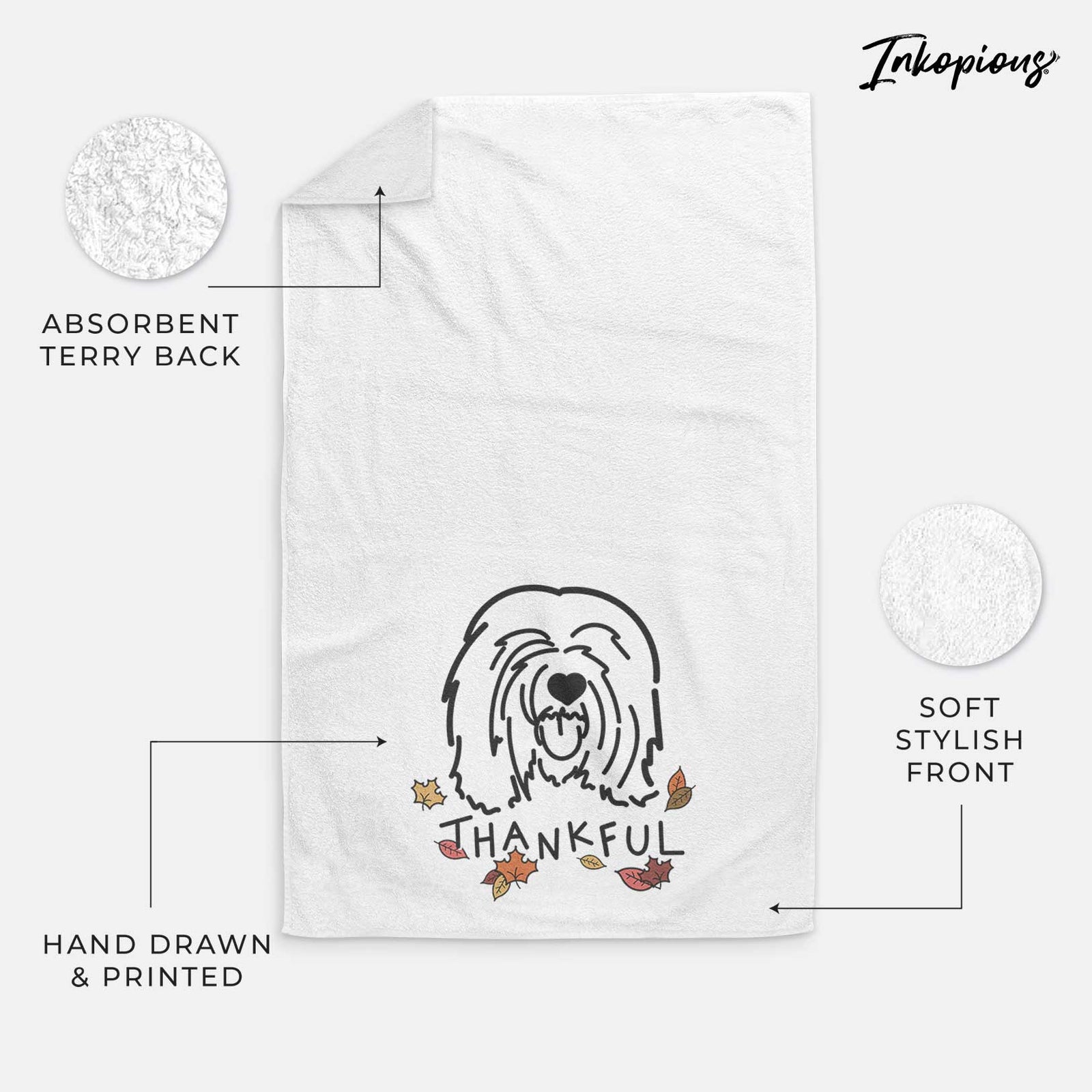Minimalist line drawing of Stan the Tibetan Mastiff with 'Thankful' lettering on a decorative hand towel