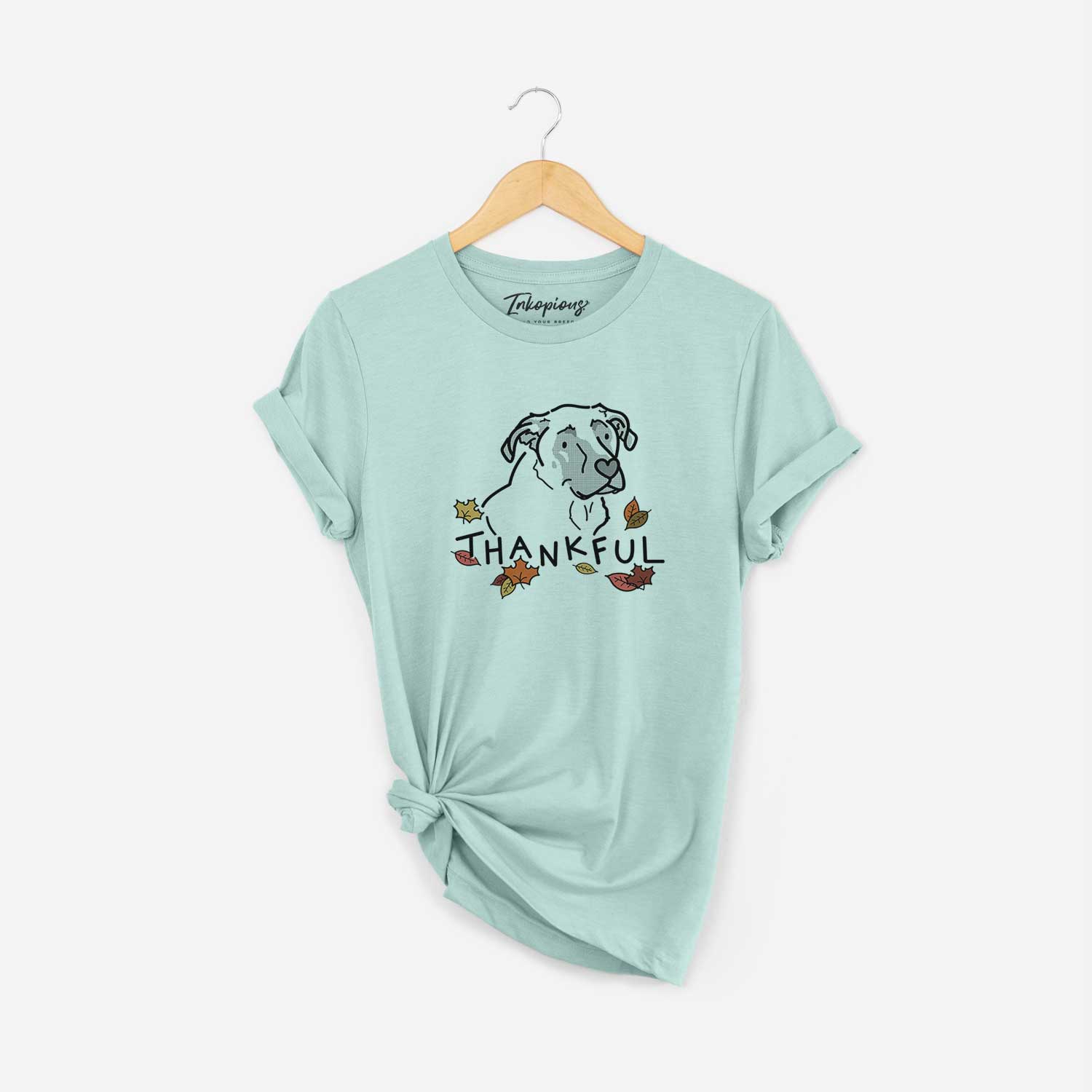 Minimalist line drawing of Tank the Mastiff German Shepherd Mix with 'Thankful' lettering on a Heather Sage Unisex crewneck