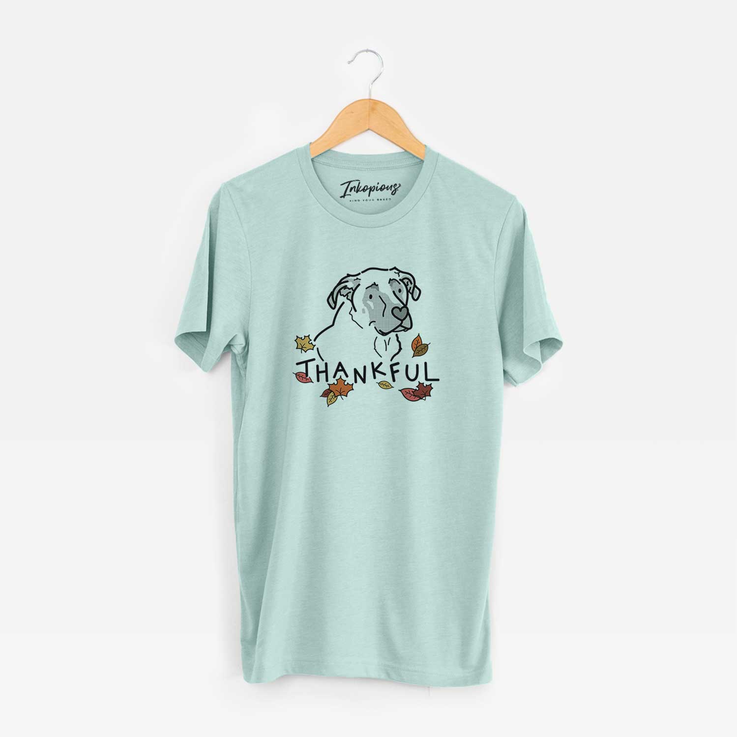 Minimalist line drawing of Tank the Mastiff German Shepherd Mix with 'Thankful' lettering on a Heather Sage Unisex crewneck