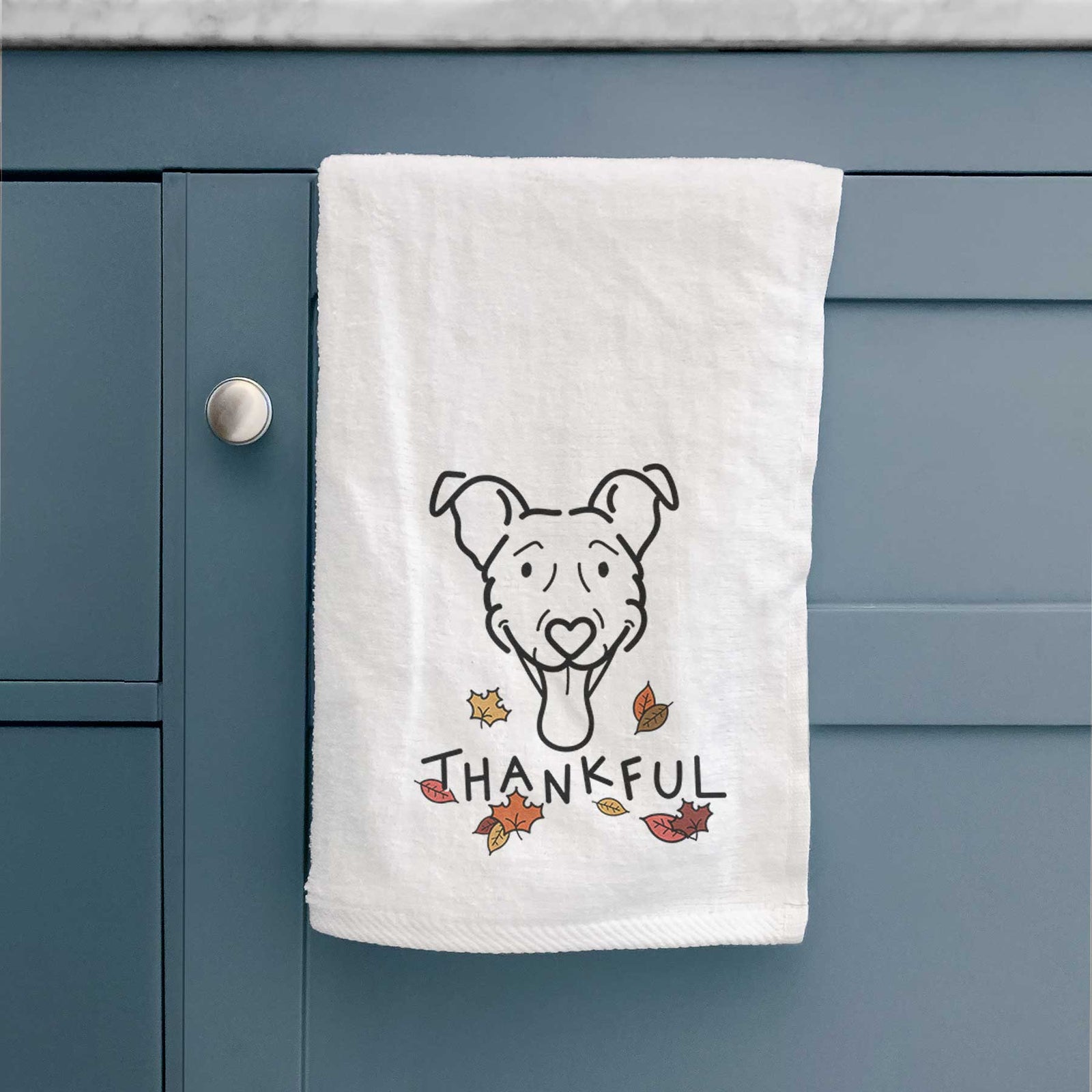 Minimalist line drawing of Tegan the Vizsla Mix with 'Thankful' lettering on a decorative hand towel