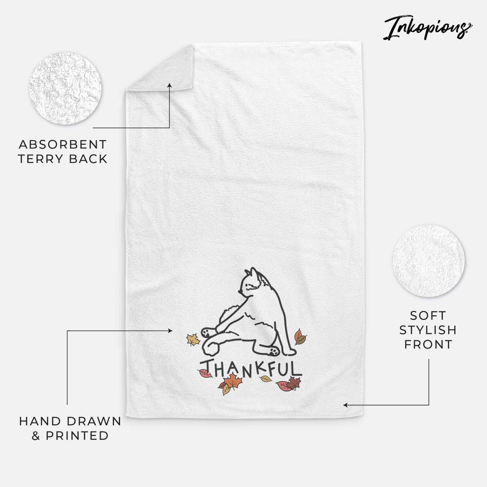 Minimalist line drawing of Tom the Cat with 'Thankful' lettering on a decorative hand towel