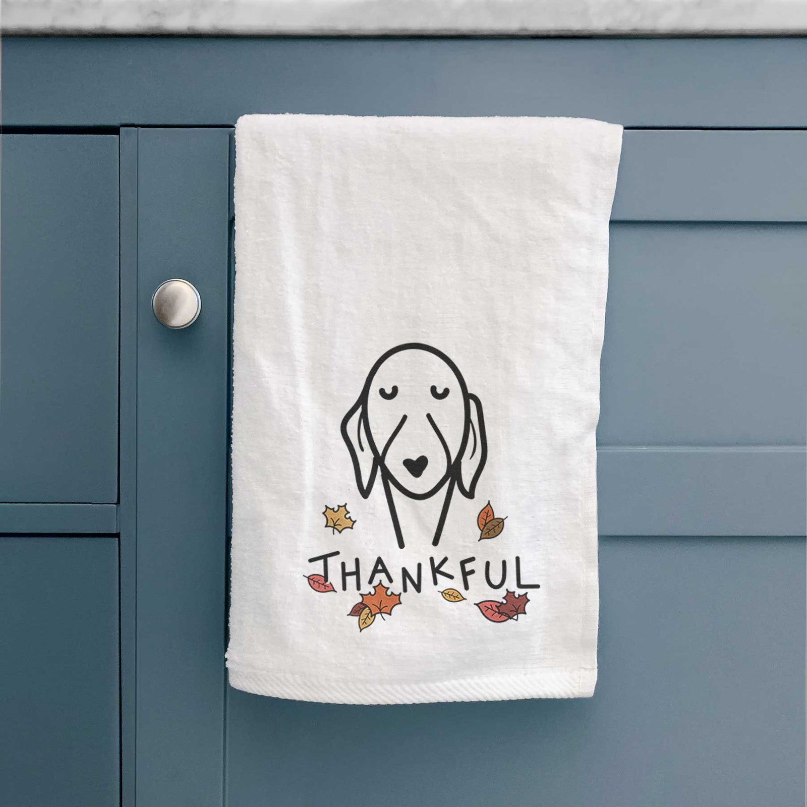 Minimalist line drawing of a Whippet with 'Thankful' lettering on a decorative hand towel