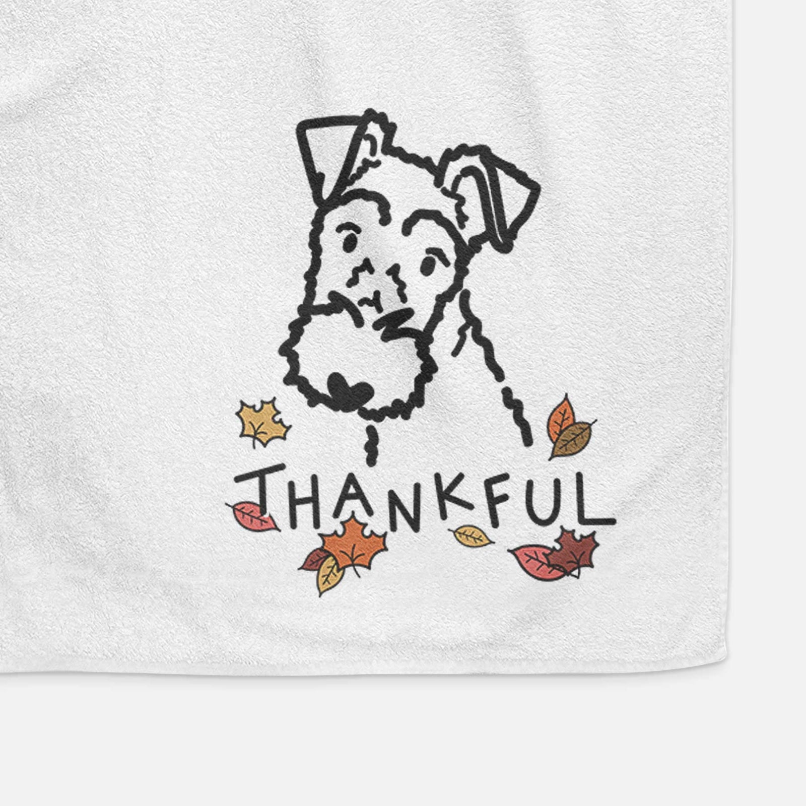 Minimalist line drawing of a Wire Fox Terrier with 'Thankful' lettering on a decorative hand towel