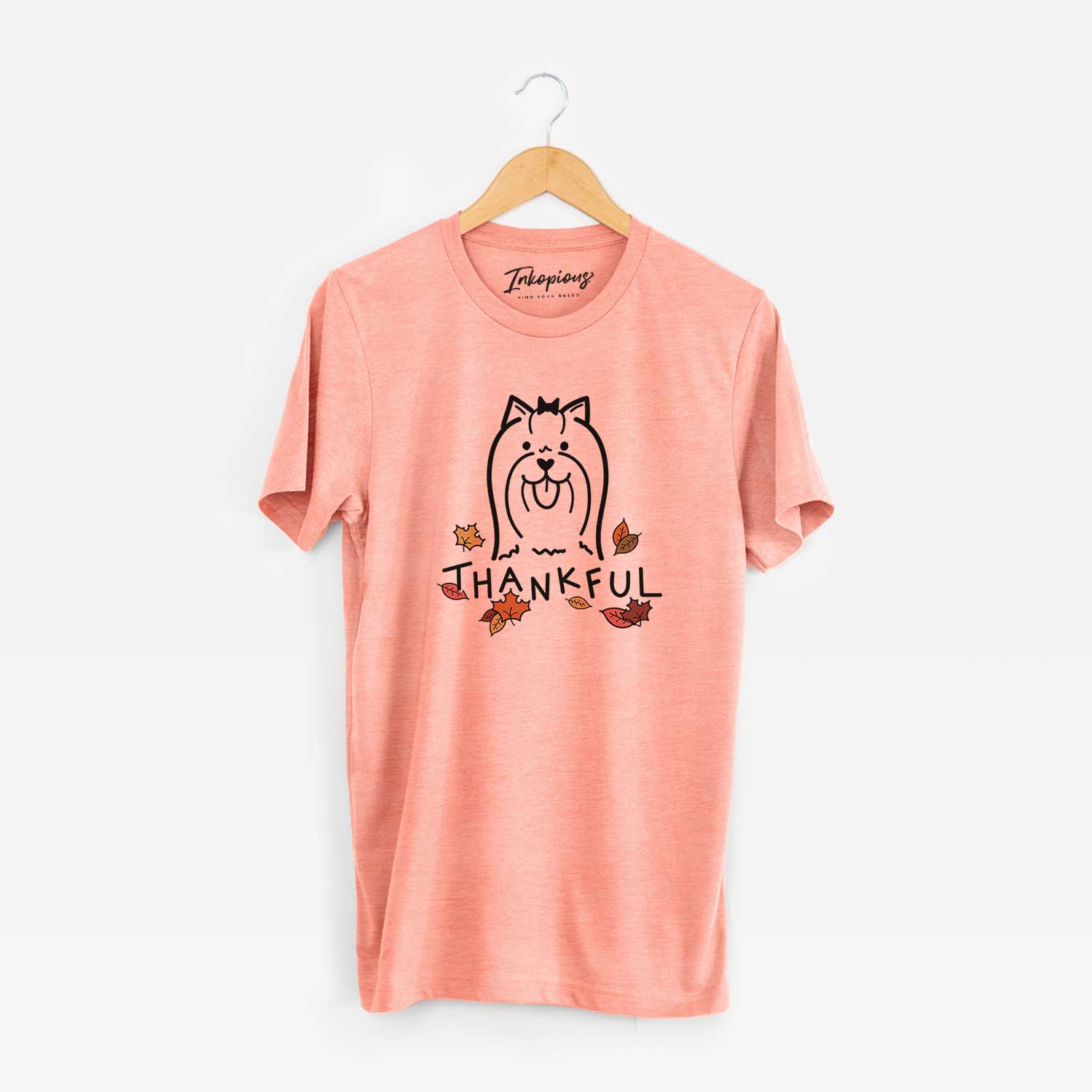 Minimalist line drawing of a Yorkshire Terrier with 'Thankful' lettering on a Sunset Unisex crewneck