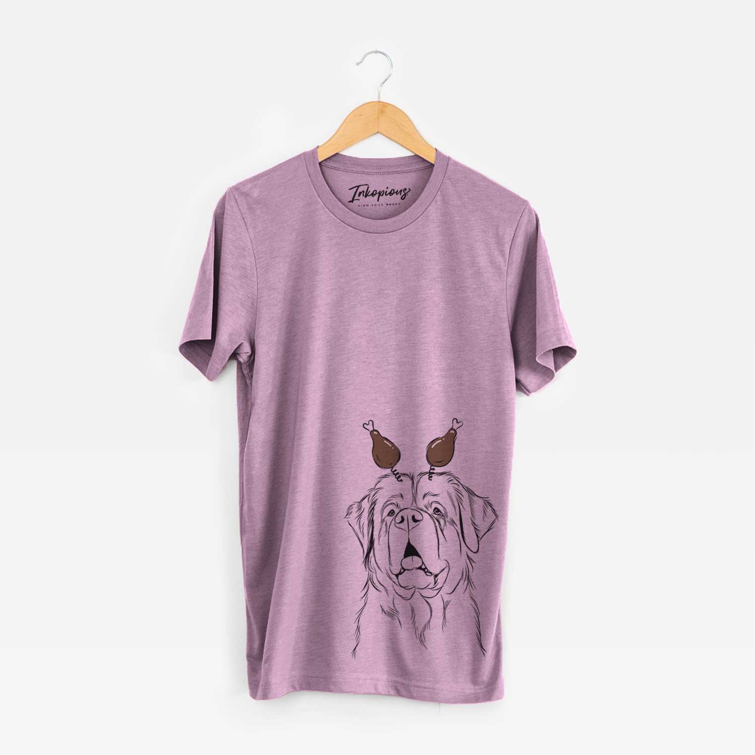 Hand-drawn sketch of Atlas the Saint Bernard with a Thanksgiving turkey headpiece on an Orchid Unisex crewneck