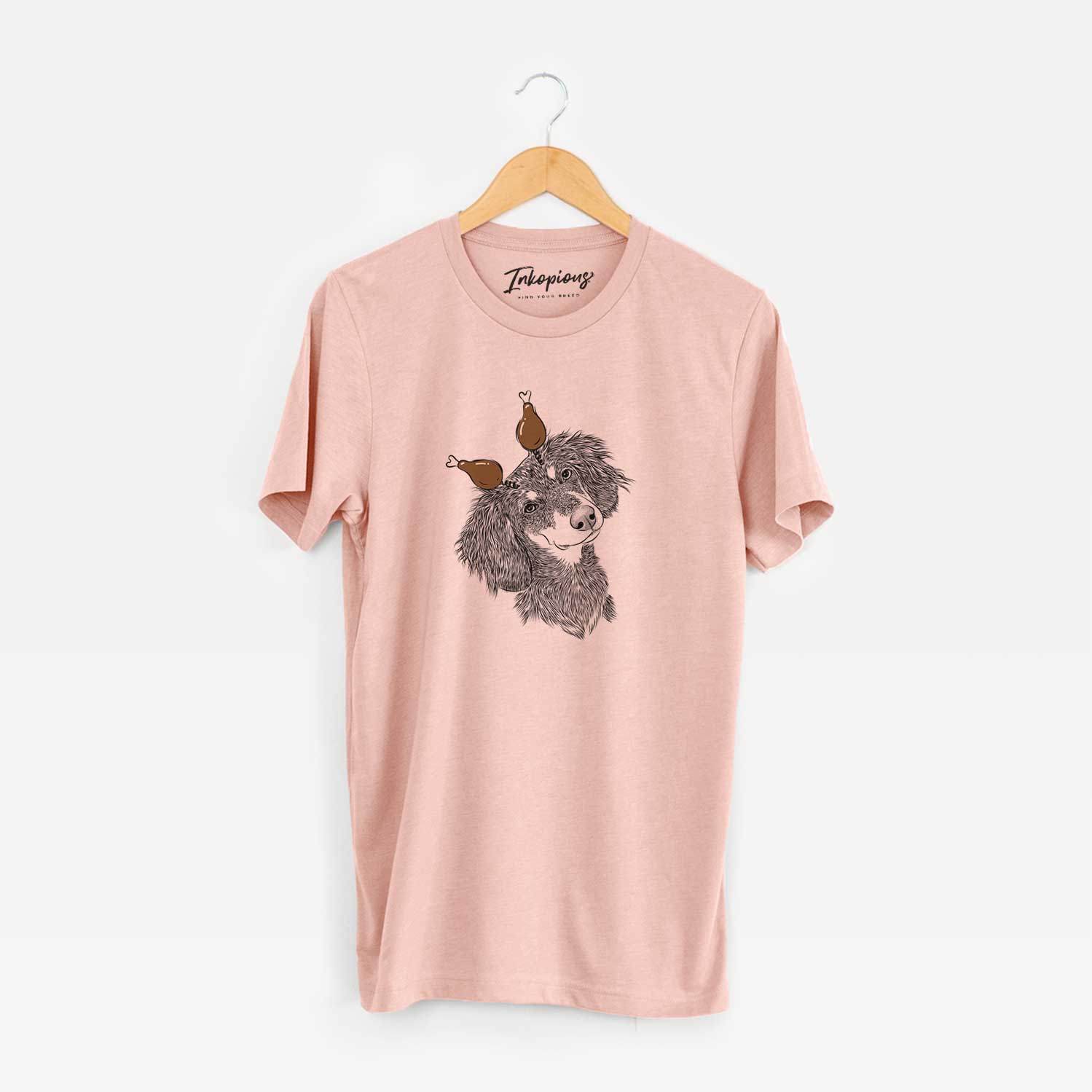 Hand-drawn sketch of Bailey the Long Haired Dachshund with a Thanksgiving turkey headpiece on a Peach Unisex crewneck