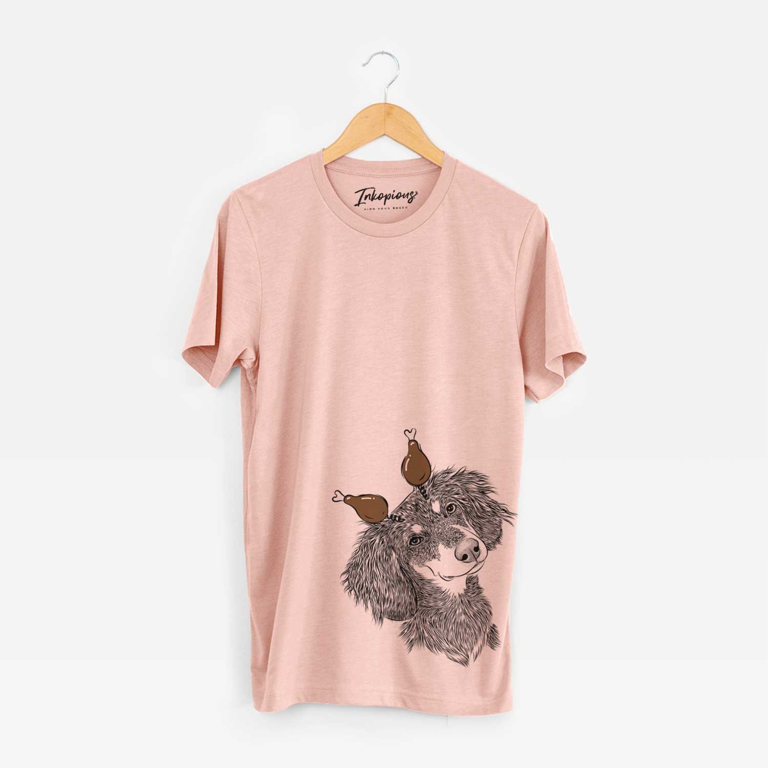 Hand-drawn sketch of Bailey the Long Haired Dachshund with a Thanksgiving turkey headpiece on a Peach Unisex crewneck
