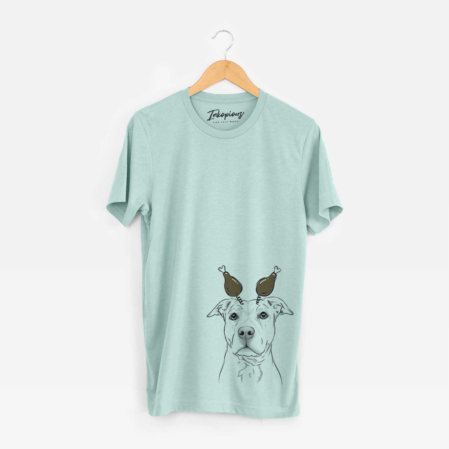 Hand-drawn sketch of Bailey the American Staffordshire Terrier with a Thanksgiving turkey headpiece on a Heather Sage Unisex crewneck
