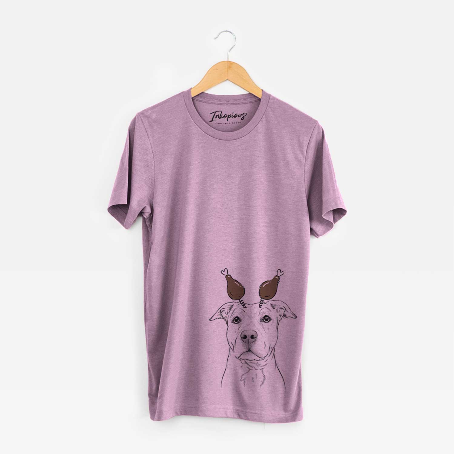 Hand-drawn sketch of Bailey the American Staffordshire Terrier with a Thanksgiving turkey headpiece on an Orchid Unisex crewneck
