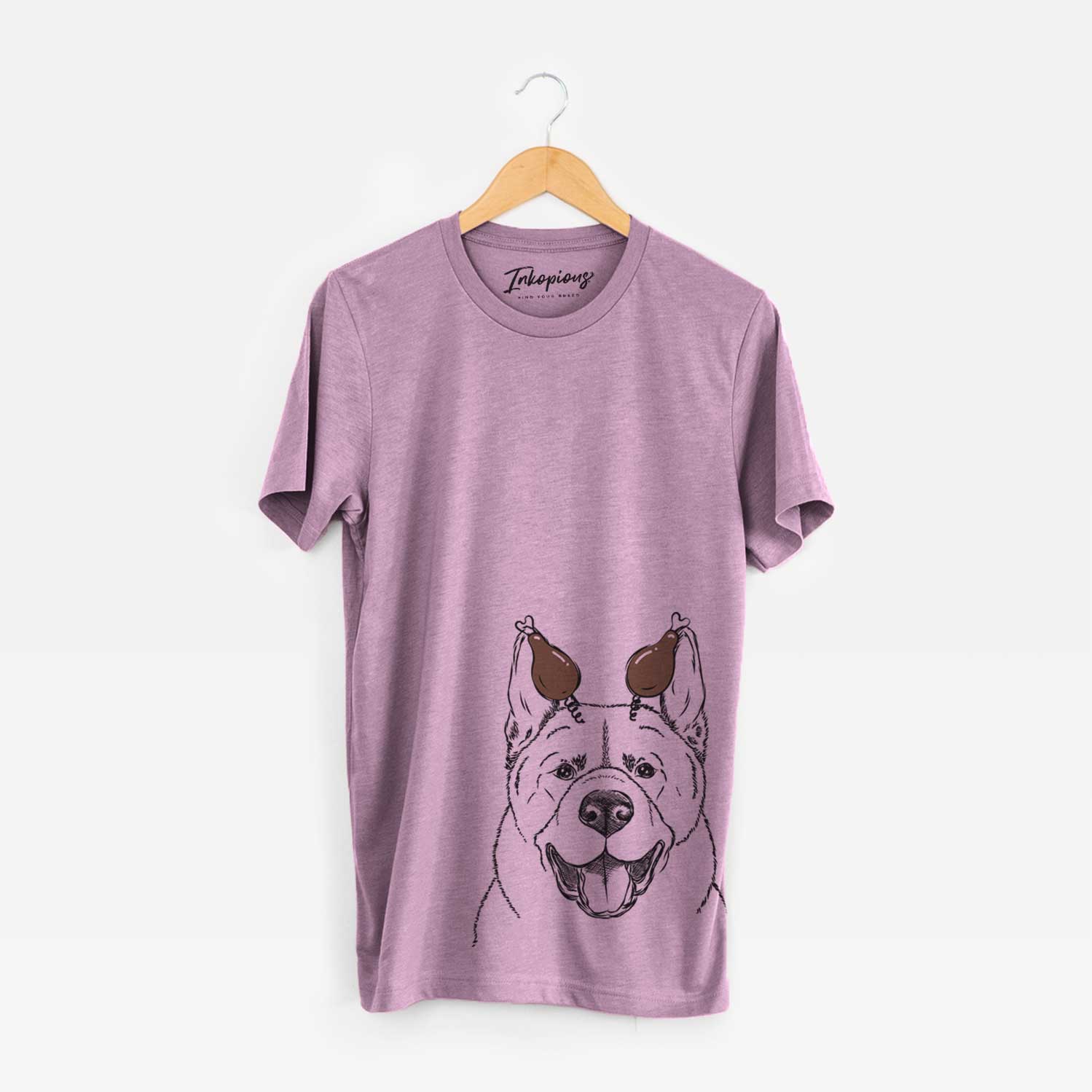 Hand-drawn sketch of Baku the Akita with a Thanksgiving turkey headpiece on an Orchid Unisex crewneck