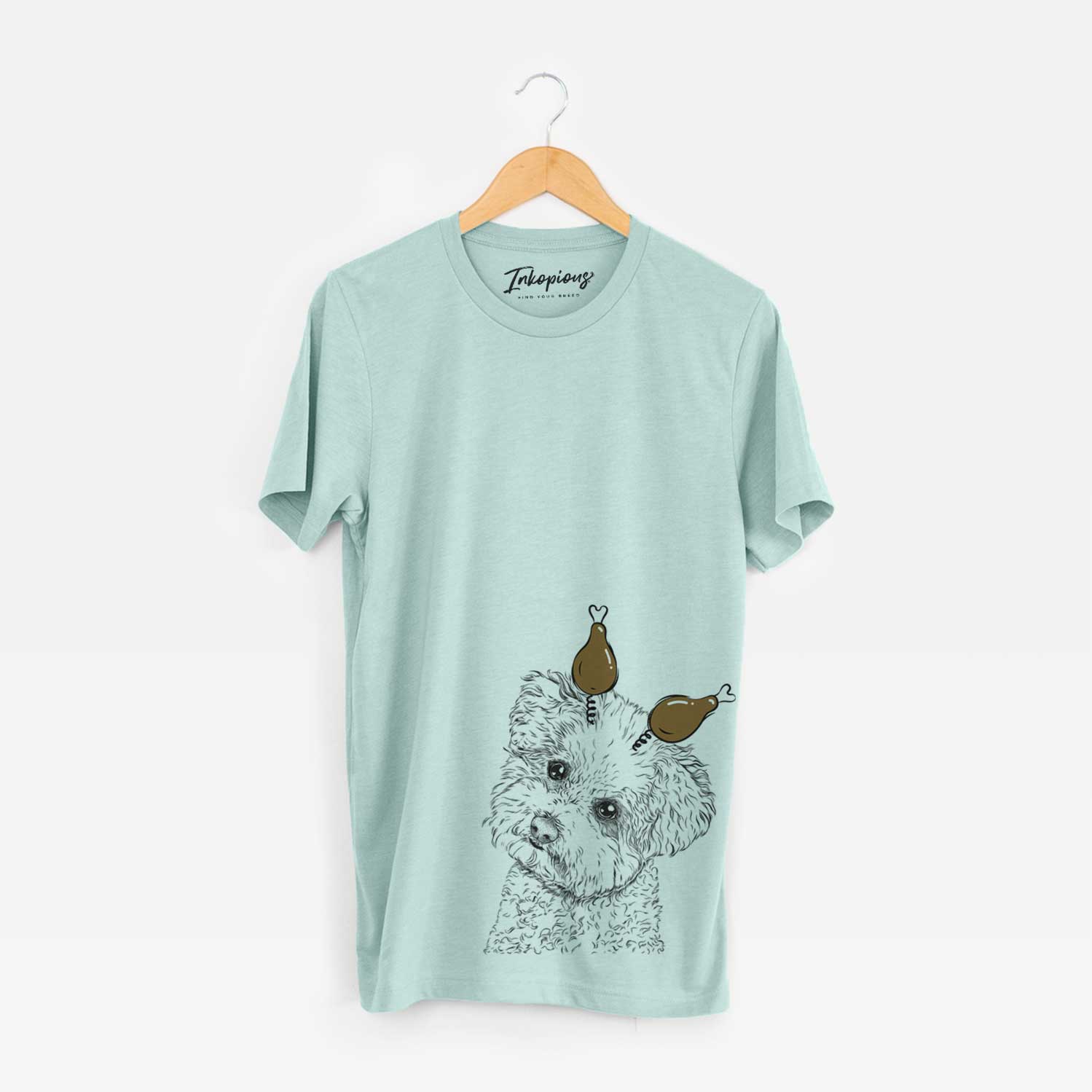 Hand-drawn sketch of Bento the Bolognese with a Thanksgiving turkey headpiece on a Heather Sage Unisex crewneck