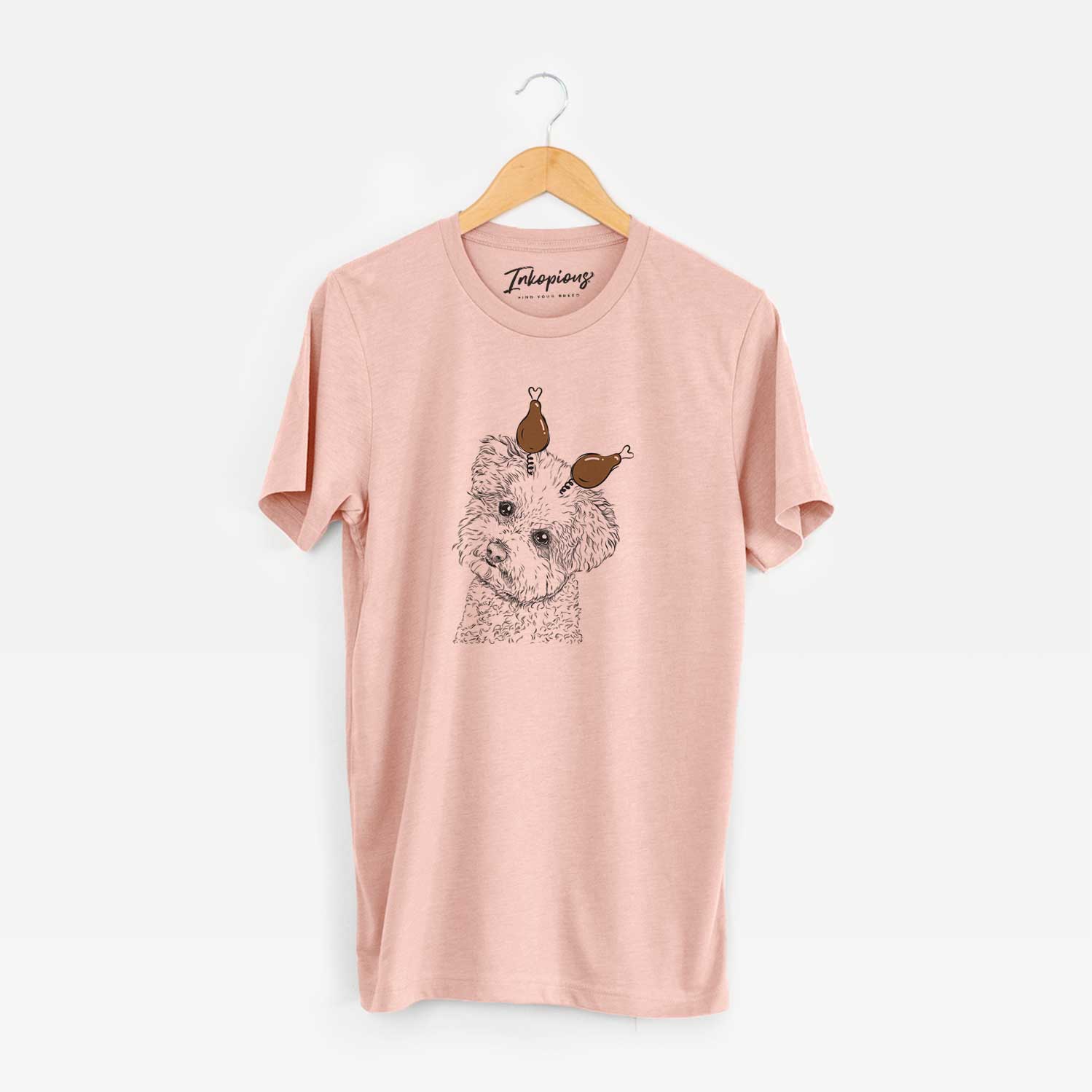 Hand-drawn sketch of Bento the Bolognese with a Thanksgiving turkey headpiece on a Peach Unisex crewneck