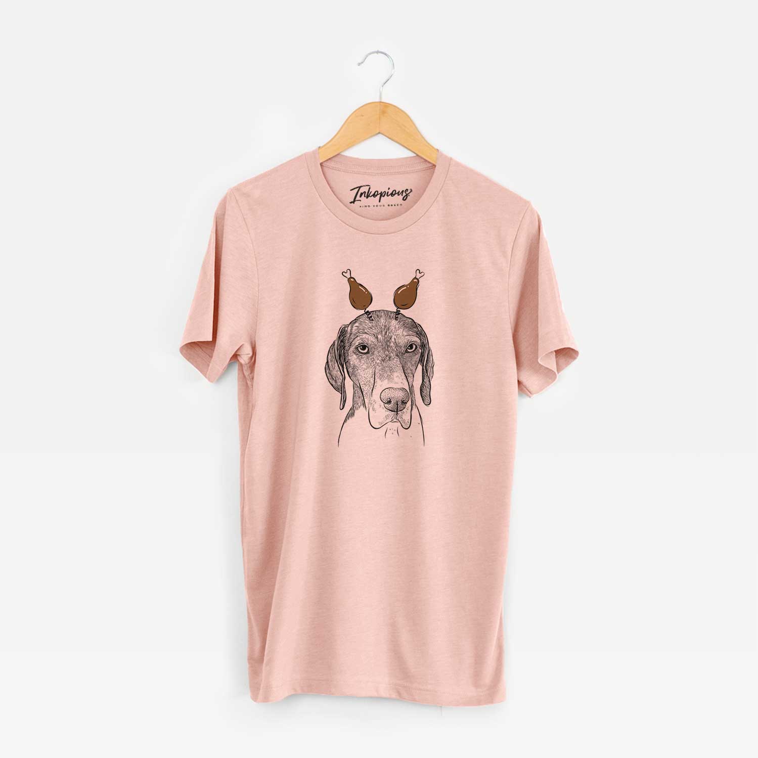 Hand-drawn sketch of Bohdi the German Shorthaired Pointer with a Thanksgiving turkey headpiece on a Peach Unisex crewneck