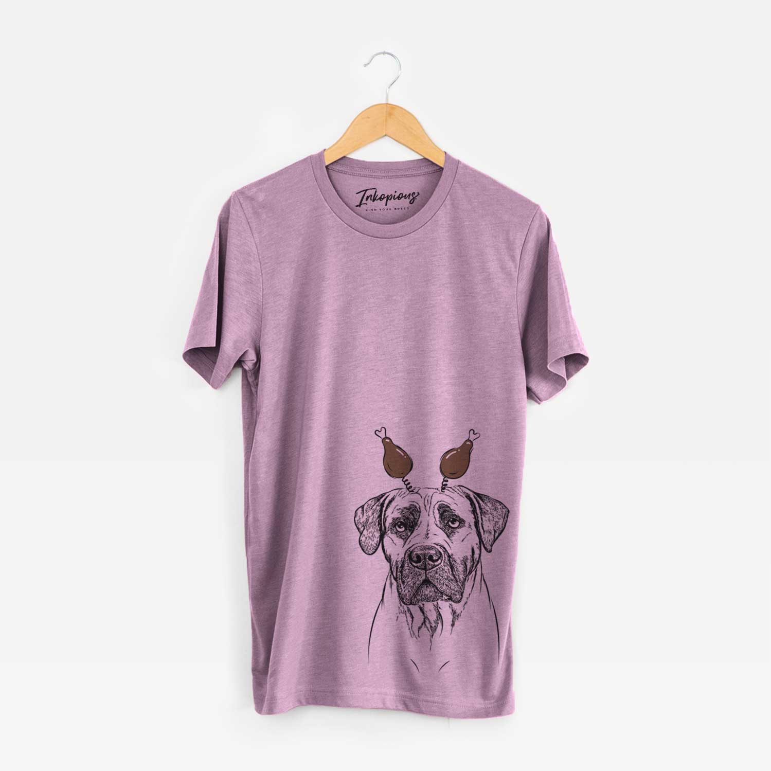 Hand-drawn sketch of Boris the Boerboel with a Thanksgiving turkey headpiece on an Orchid Unisex crewneck