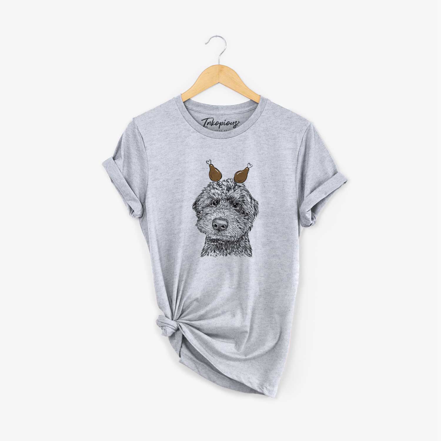Hand-drawn sketch of Bowser the Whoodle with a Thanksgiving turkey headpiece on a Grey Unisex crewneck