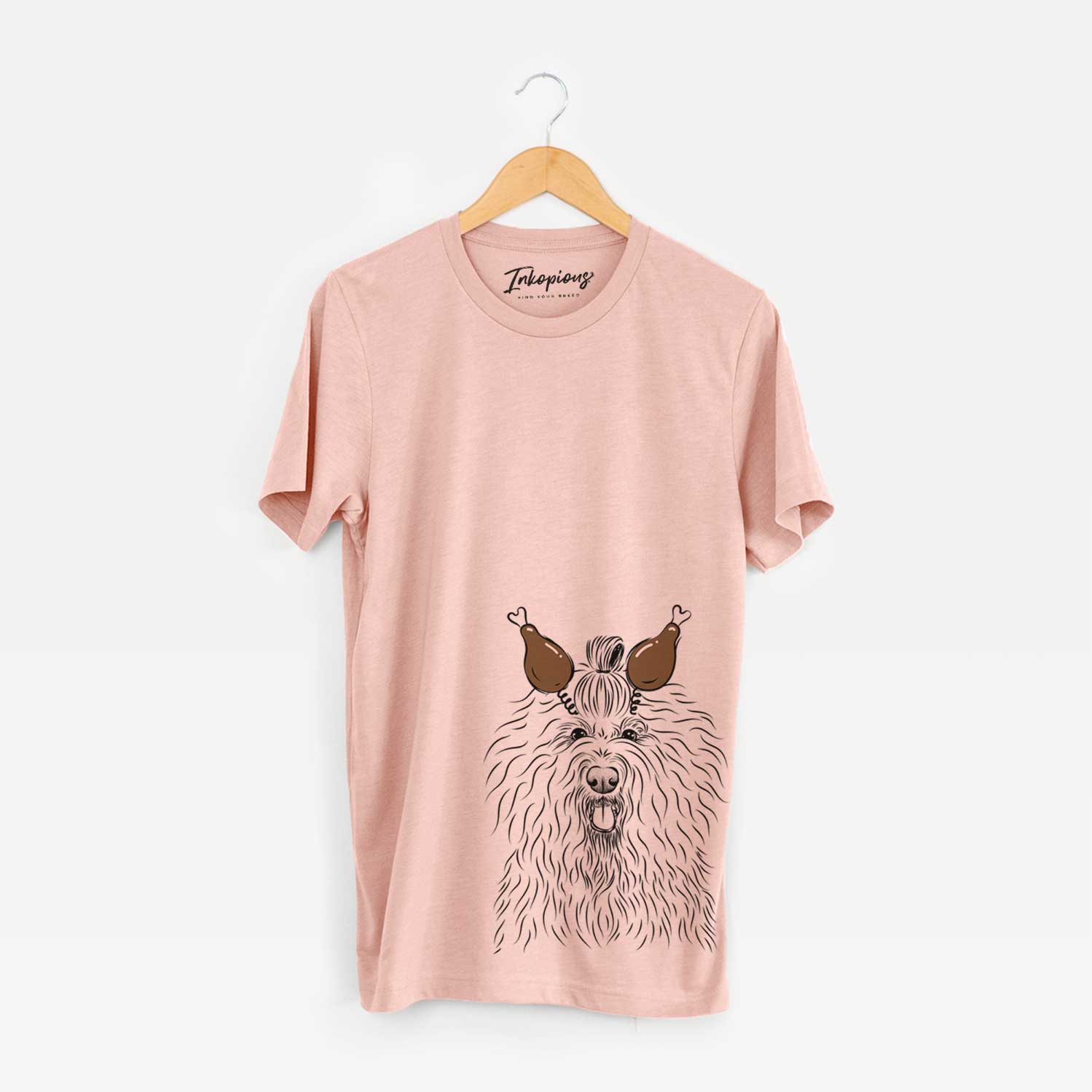 Hand-drawn sketch of Brody the Old English Sheepdog with a Thanksgiving turkey headpiece on a Peach Unisex crewneck