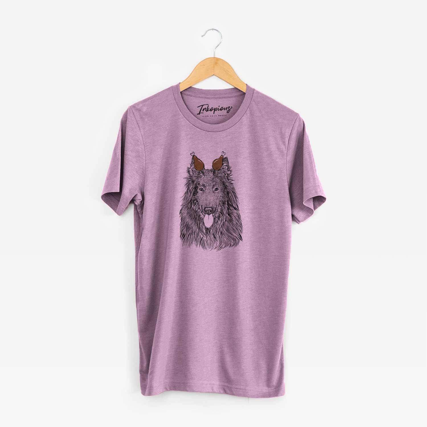 Hand-drawn sketch of Daan the Belgian Shepherd with a Thanksgiving turkey headpiece on an Orchid Unisex crewneck