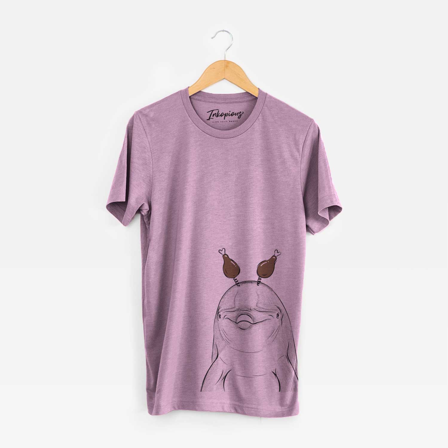 Hand-drawn sketch of Dave the Dolphin with a Thanksgiving turkey headpiece on an Orchid Unisex crewneck