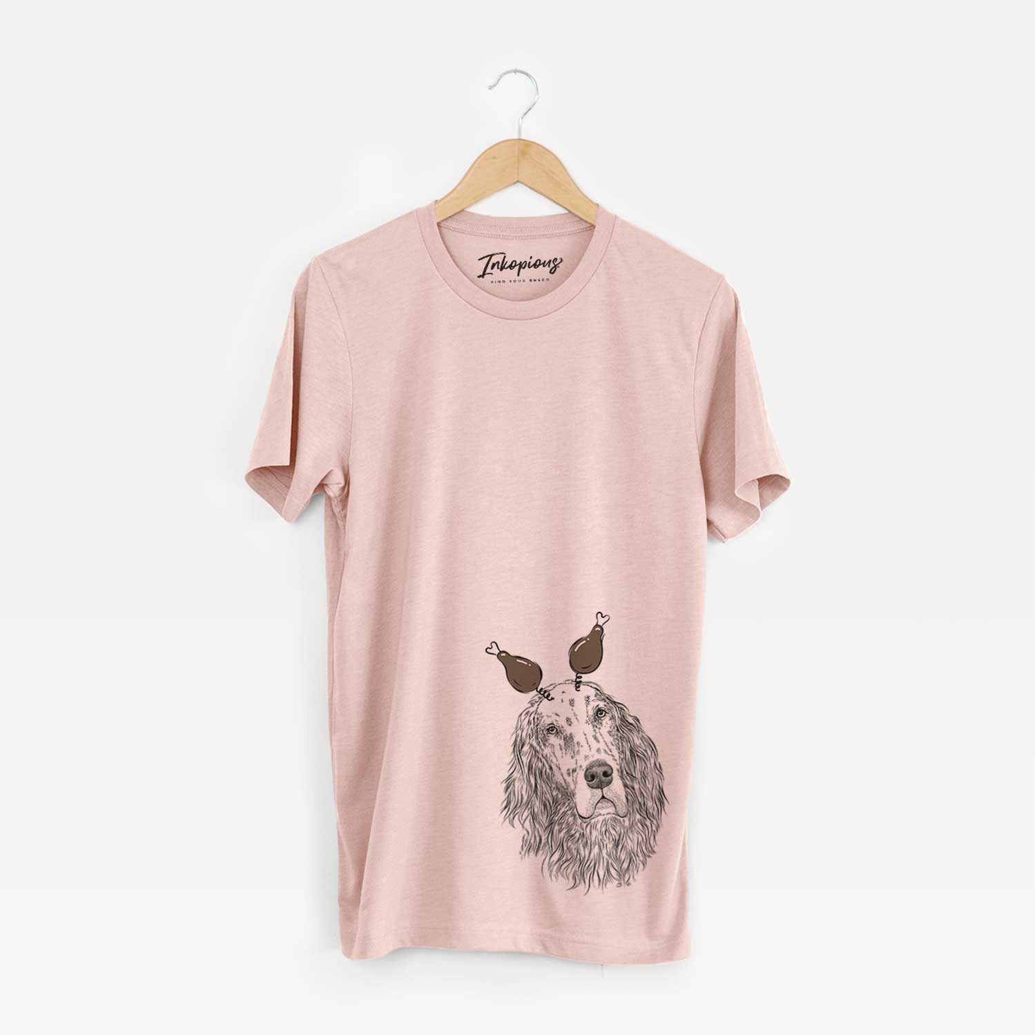 Hand-drawn sketch of Dexter the English Setter with a Thanksgiving turkey headpiece on a Peach Unisex crewneck
