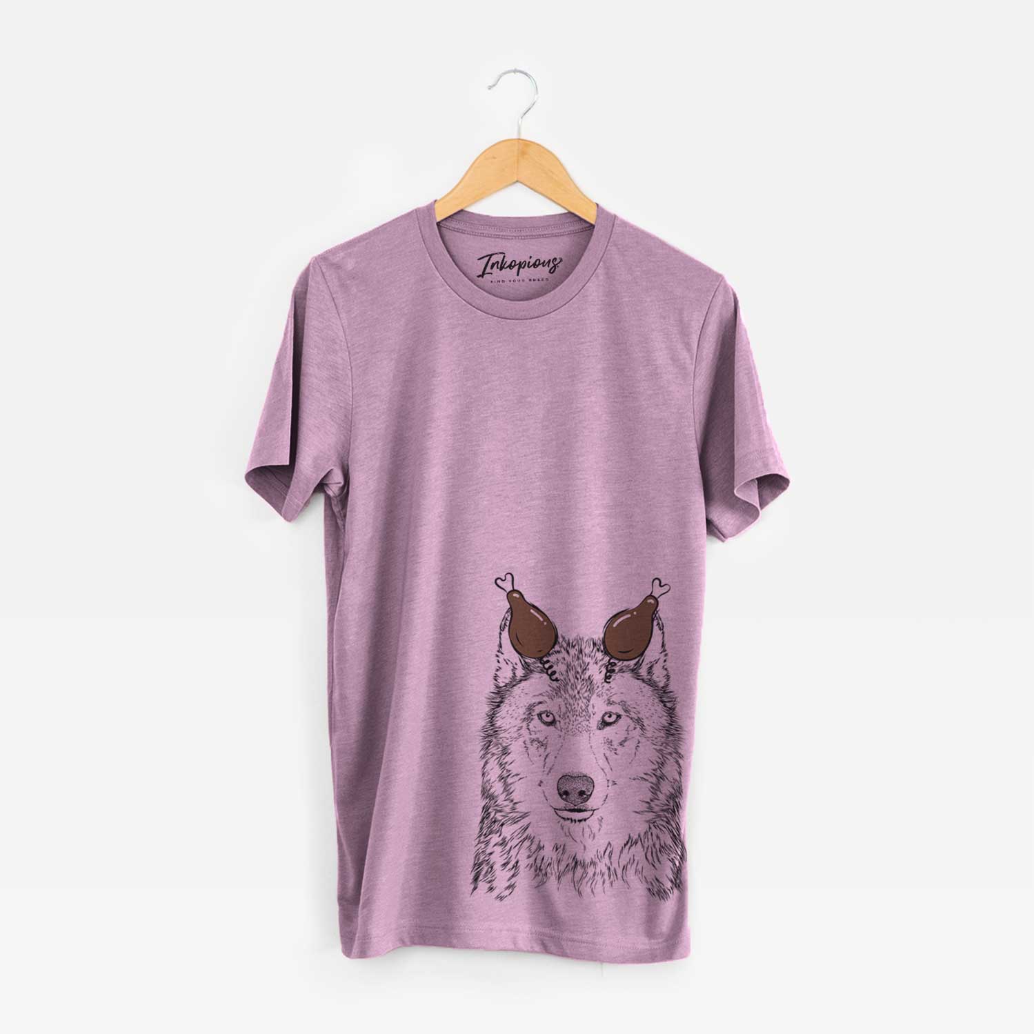 Hand-drawn sketch of Django the Grey Wolf with a Thanksgiving turkey headpiece on an Orchid Unisex crewneck