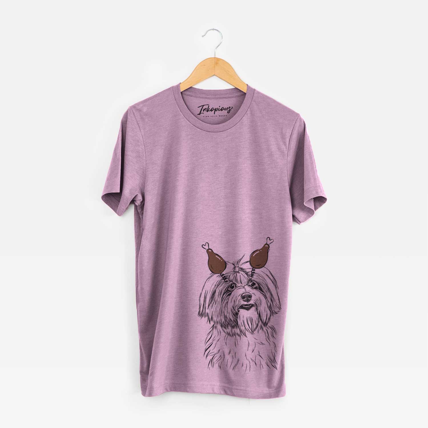 Hand-drawn sketch of Dooley the Havanese with a Thanksgiving turkey headpiece on an Orchid Unisex crewneck