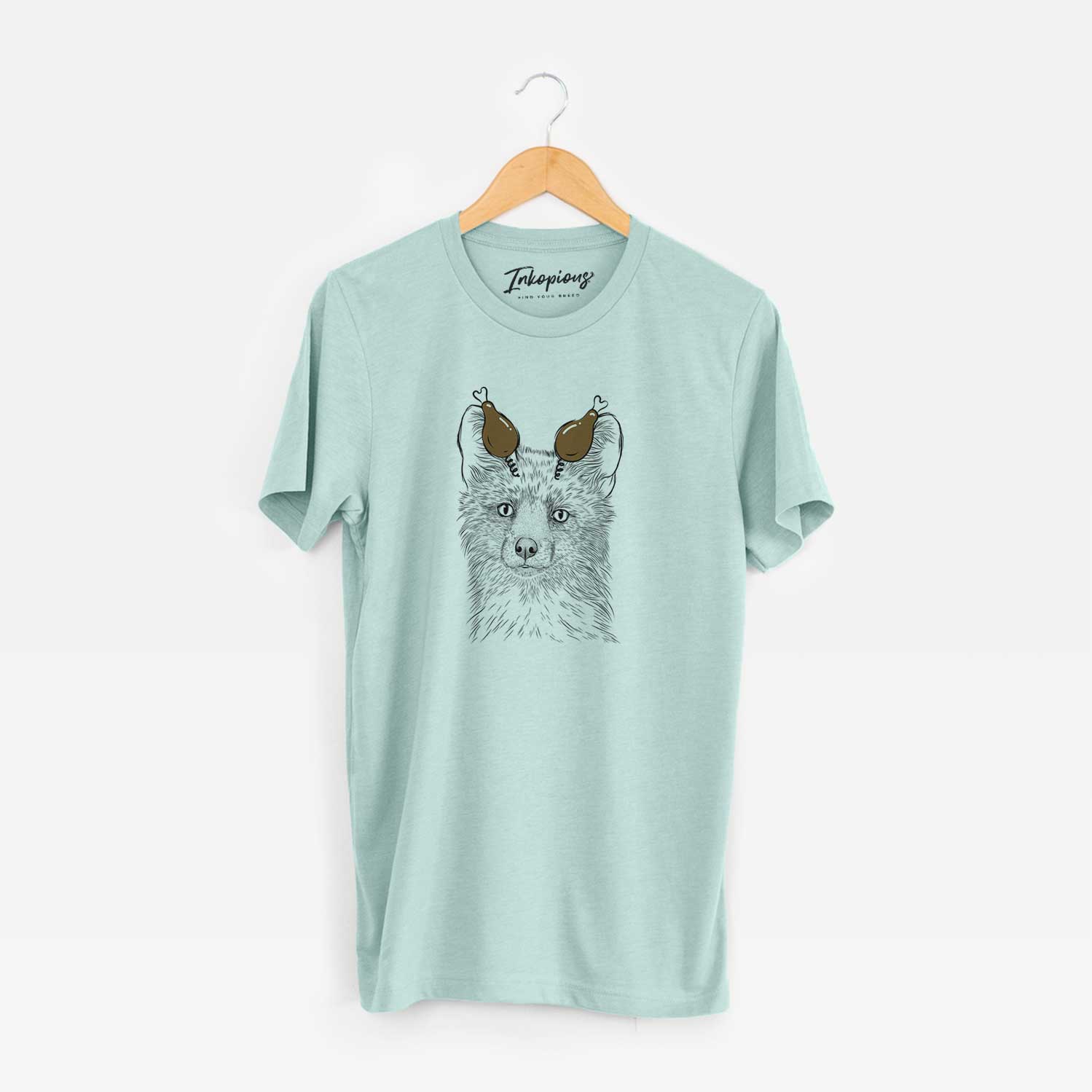 Hand-drawn sketch of Drax the Red Fox with a Thanksgiving turkey headpiece on a Heather Sage Unisex crewneck