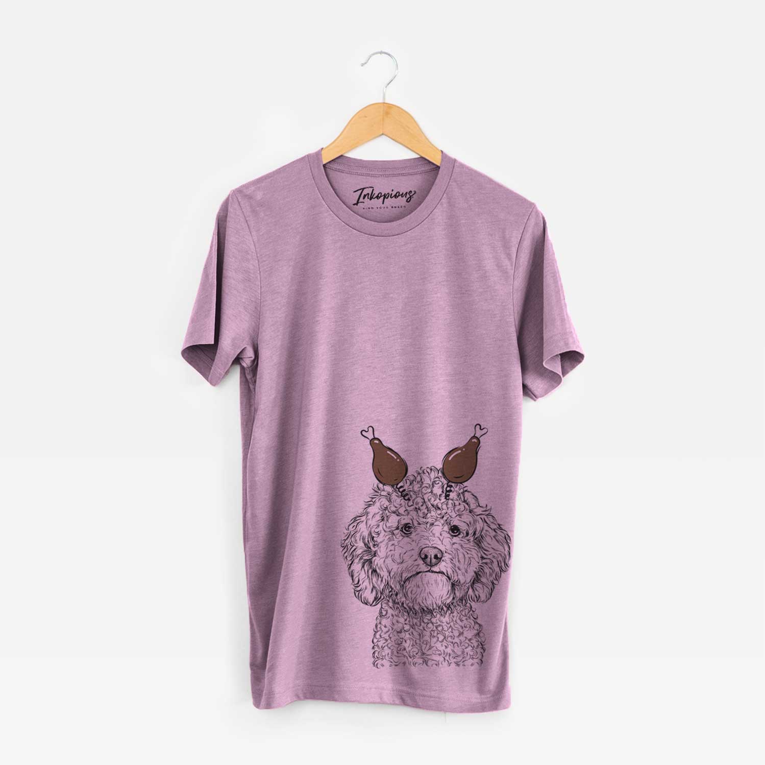 Hand-drawn sketch of Edgar the Shihpoo with a Thanksgiving turkey headpiece on an Orchid Unisex crewneck